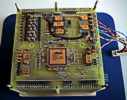 Servisný systém ESS je realizovaný z komponentov najvyššej triedy kozmickej kvalifikácia a radiačnej odolnosti, srdcom je procesor Harris HS80C86RH a programovateľné logické polia Actel A1280RH.