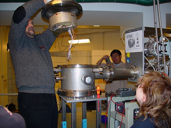 Calibration with an energetic neutral atom beam at Manne Siegbahn Laboratory, Stockholm, Sweden. Insertion of the sensor head into the vacuum chamber.