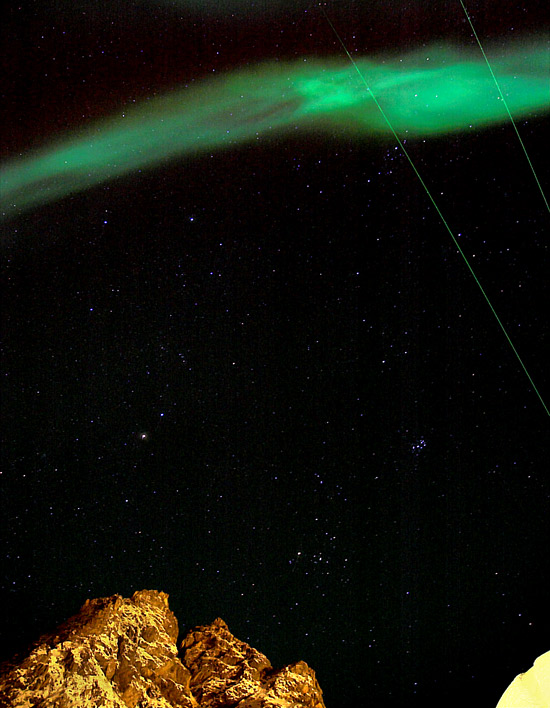  Aurora borealis and laser beams from the lidars of ALOMAR. Popular stellar constellations Pleiades, Hyades and Perseus in background.